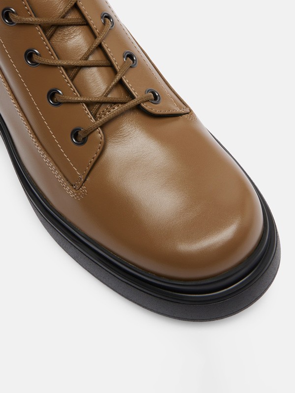 El sofisticado color LENTEJA para las botinetas TODS del próximo invierno