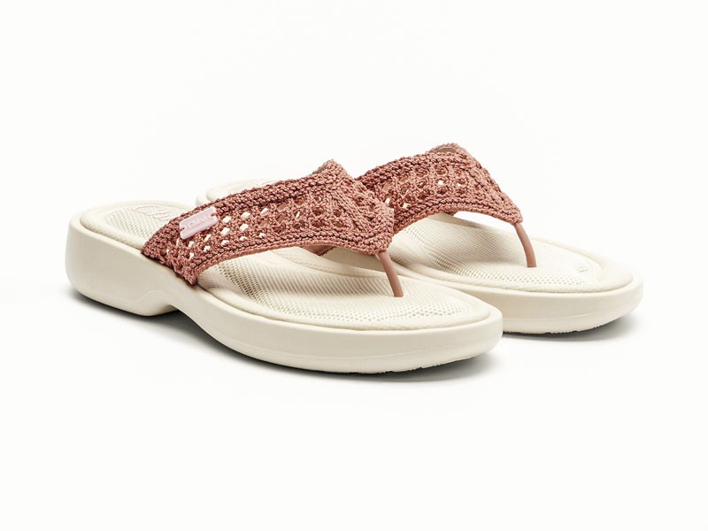 Beach flip-flops build identity through color and flat soles