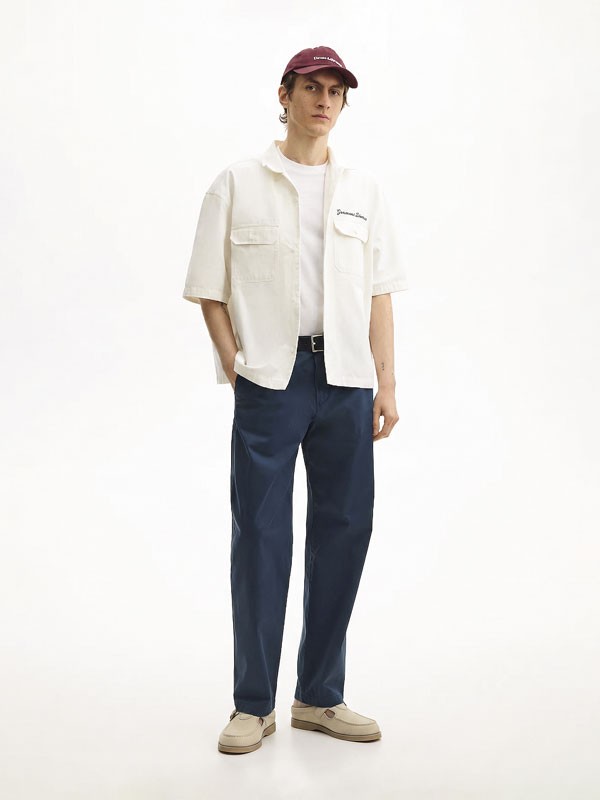 Men’s mules reshape backless footwear through broader fronts