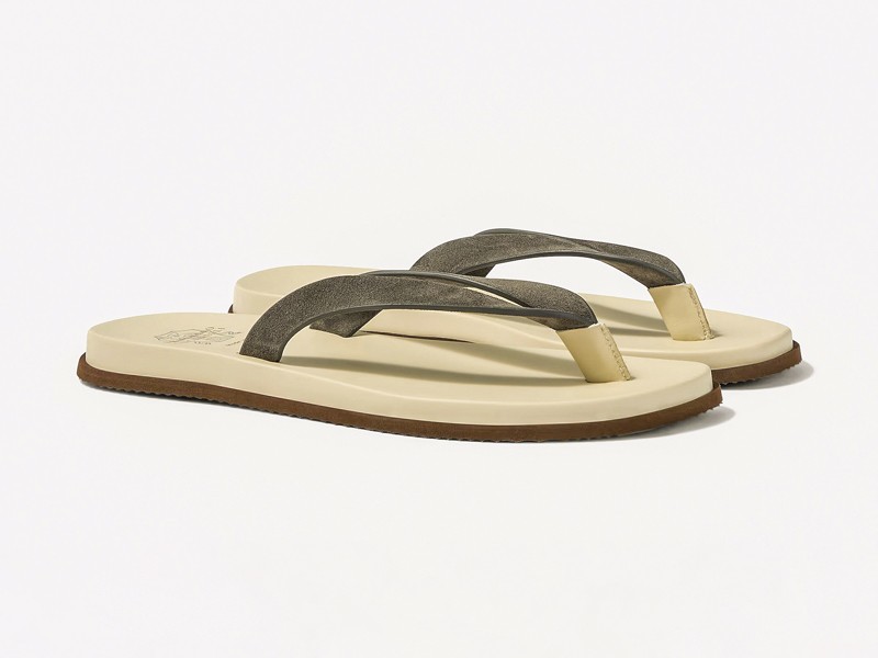 P01187292.jpg Men’s flip-flops highlight profiled soles beneath minimal straps