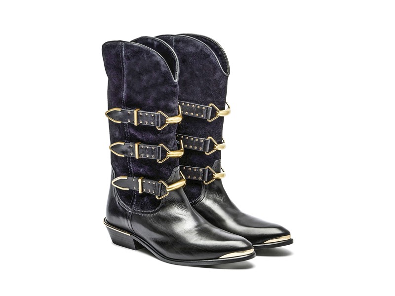 Cowboy boots with tall shafts and pointed toes