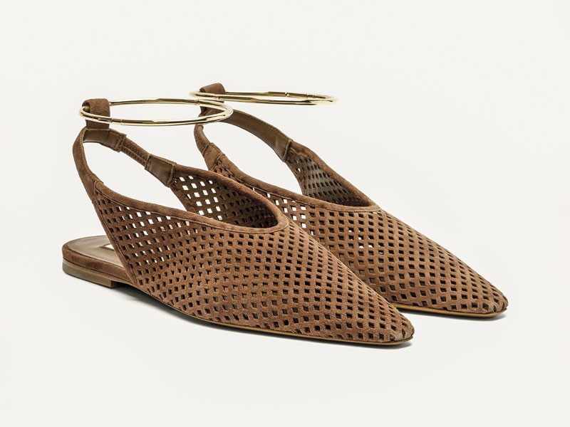 Textured slingbacks highlight pointed toes and back straps