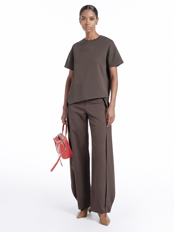 Earth and blue tones differentiate high-heeled sandals