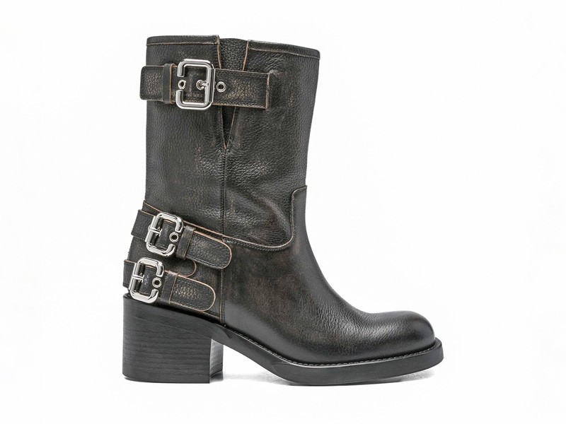 High boots in black and brown with texture focus