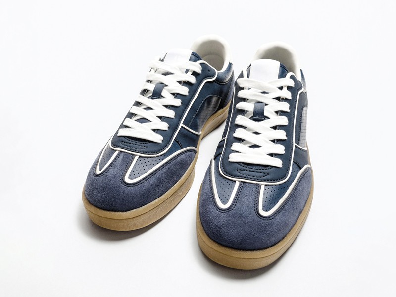 Olive-toned urban sneakers with suede cues and gum sole units