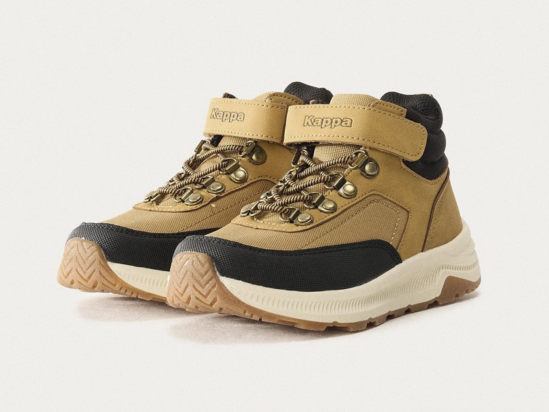 Kids outdoor footwear with traction soles and protective reinforcements