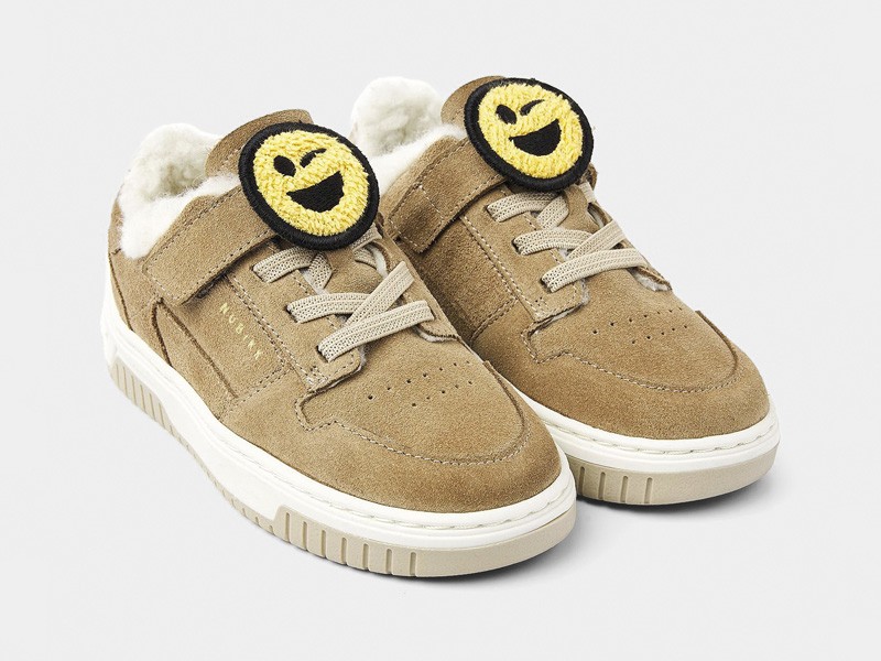 Kids footwear with visible fleece textures and warmth