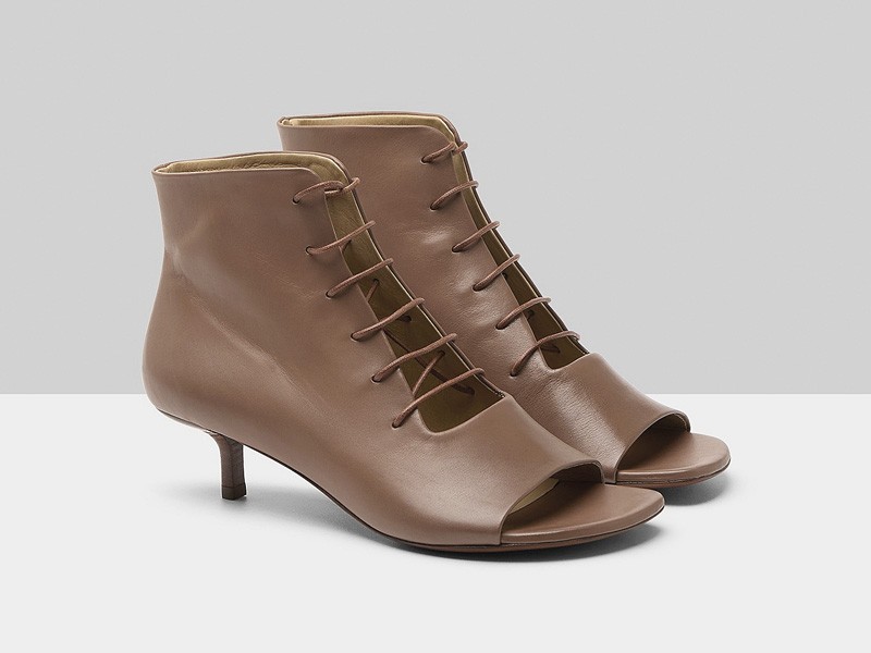 Lace-up dress booties with hardware accents