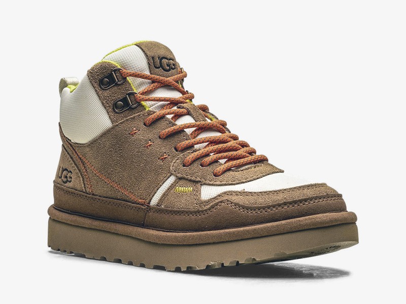 Workwear boots with track soles and visible stitching