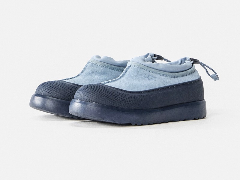 Kids outdoor footwear with traction soles and protective reinforcements