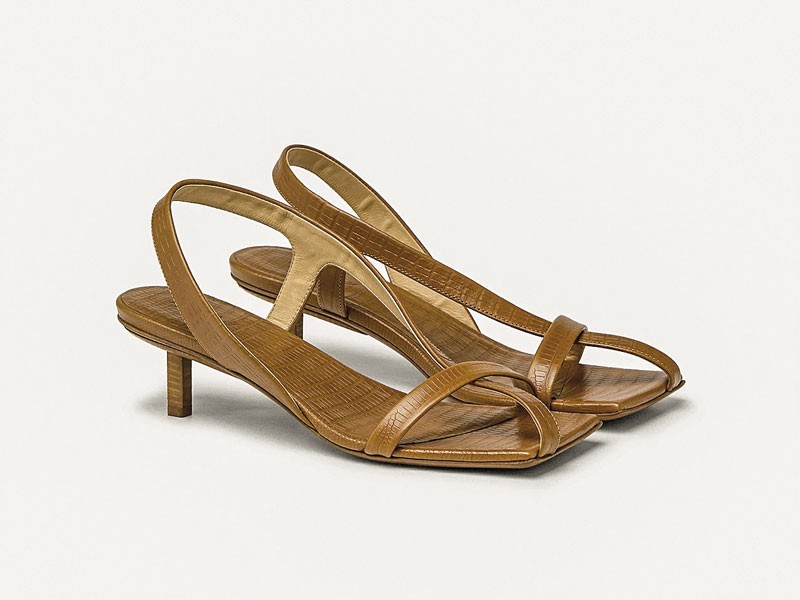 High sandals balance thin straps, color and volume