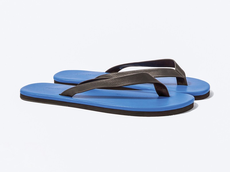 P01178731.jpg Men’s flip-flops highlight profiled soles beneath minimal straps