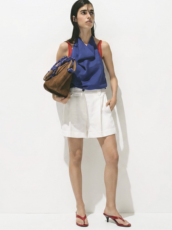 High flip-flops elevate minimal straps with precise heels