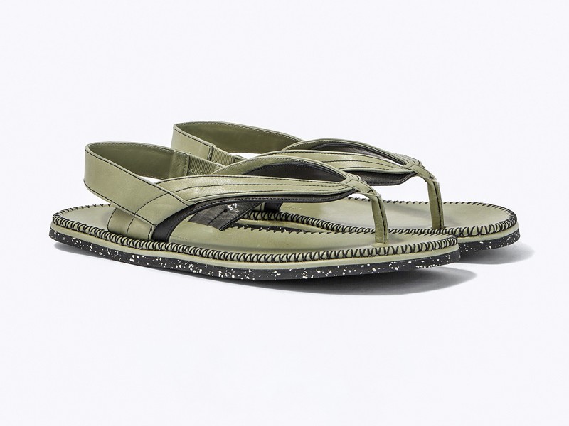 P01162610.jpg Men’s flip-flops highlight profiled soles beneath minimal straps