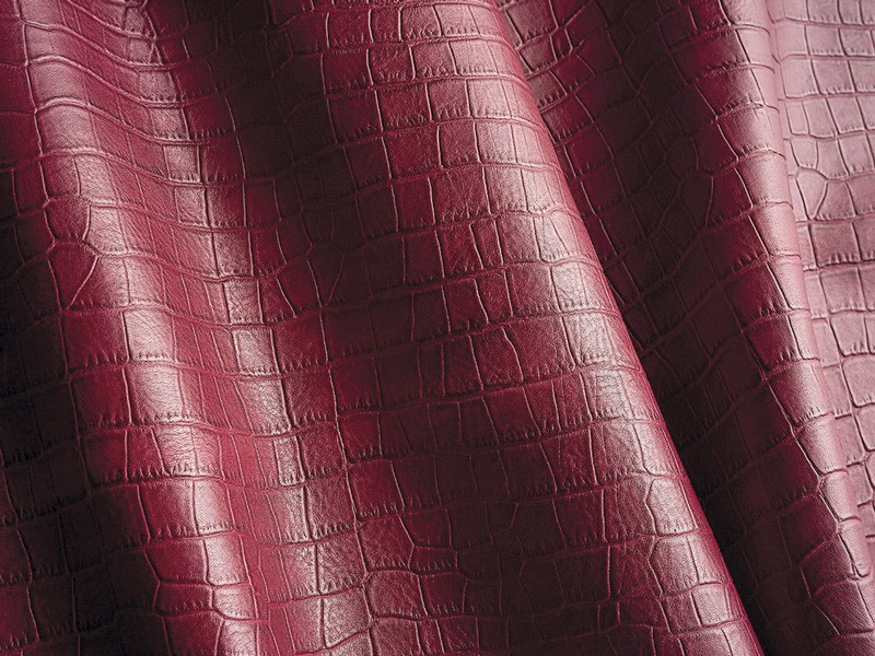 Leathers emphasize textures, color and woven surfaces
