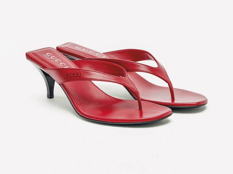 High flip-flops elevate minimal straps with precise heels