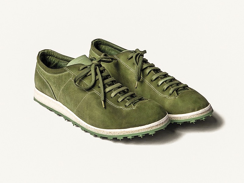 Olive-toned urban sneakers with suede cues and gum sole units