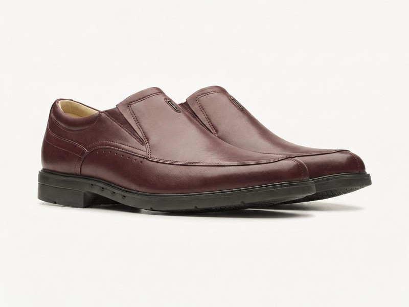 Men’s merlot-tone footwear in leather and suede finishes