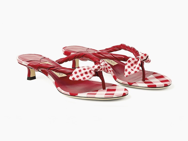 High flip-flops elevate minimal straps with precise heels