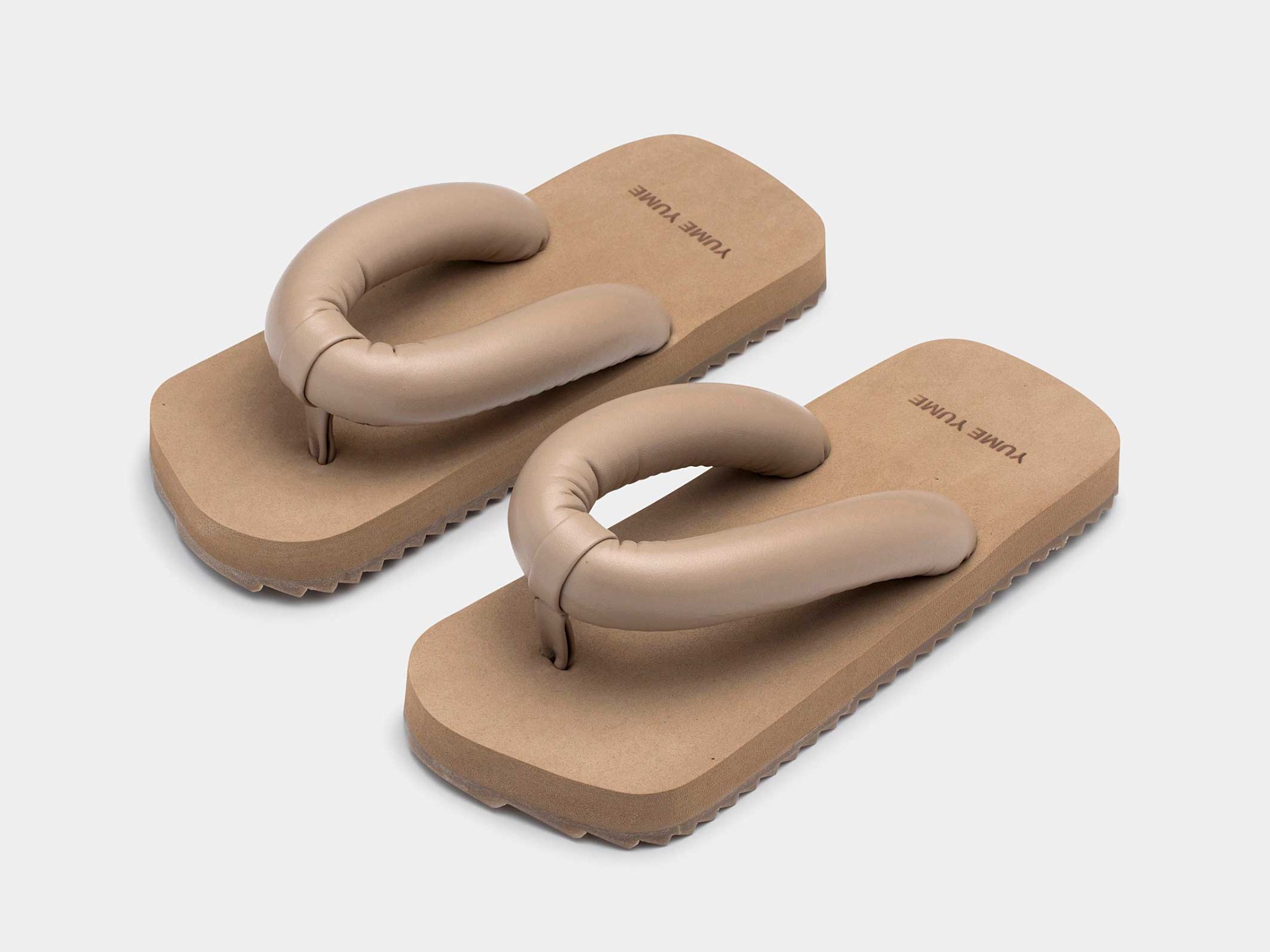The furor of flip flops and slides with tubular and inflated strips