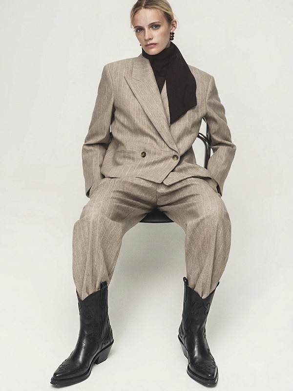 Cowboy boots with tall shafts and pointed toes