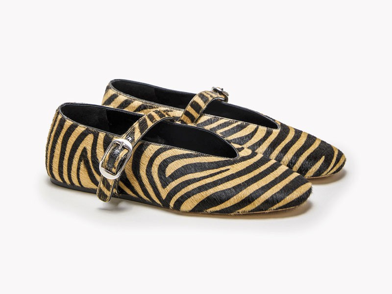 Animal-print ballerinas focus on surface and contrast