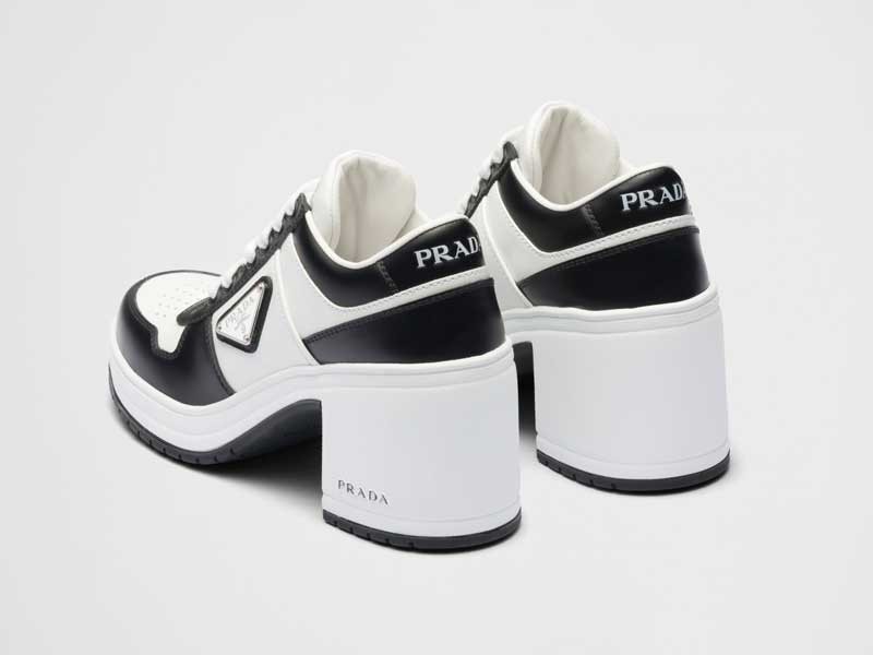 EXCLUSIVE. PRADA puts heels on sports shoes