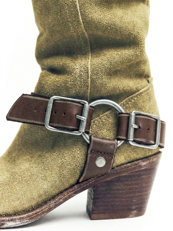 Cowboy boots with tall shafts and pointed toes