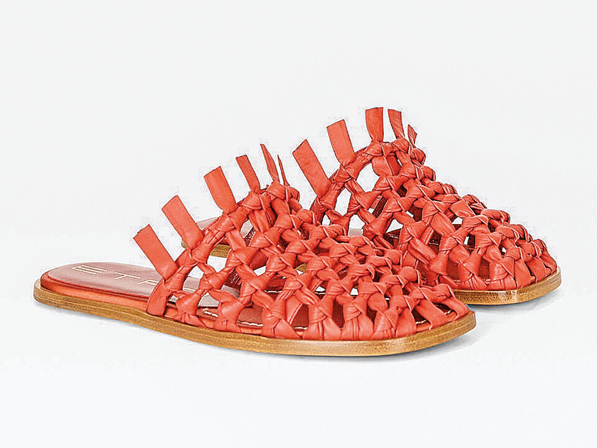 Flat mules with interwoven uppers
